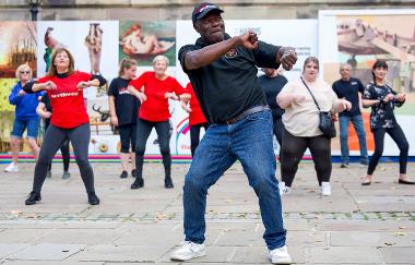 People dancing on the Flag Market
