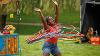 Woman hula hooping with lots of hula hoops