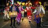 Band performing in torchlight procession