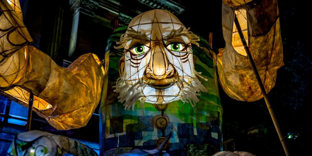 Giant lantern in the shape of a giant man with a city on his back, from Brief Encounter 2017.