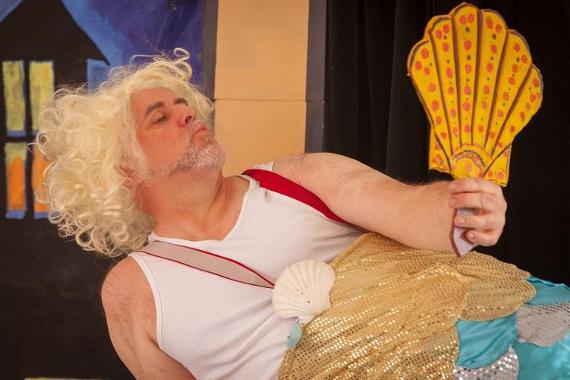 Man dressed as a mermaid during Lancashire Encounter 2018 performances on Winckley Square.